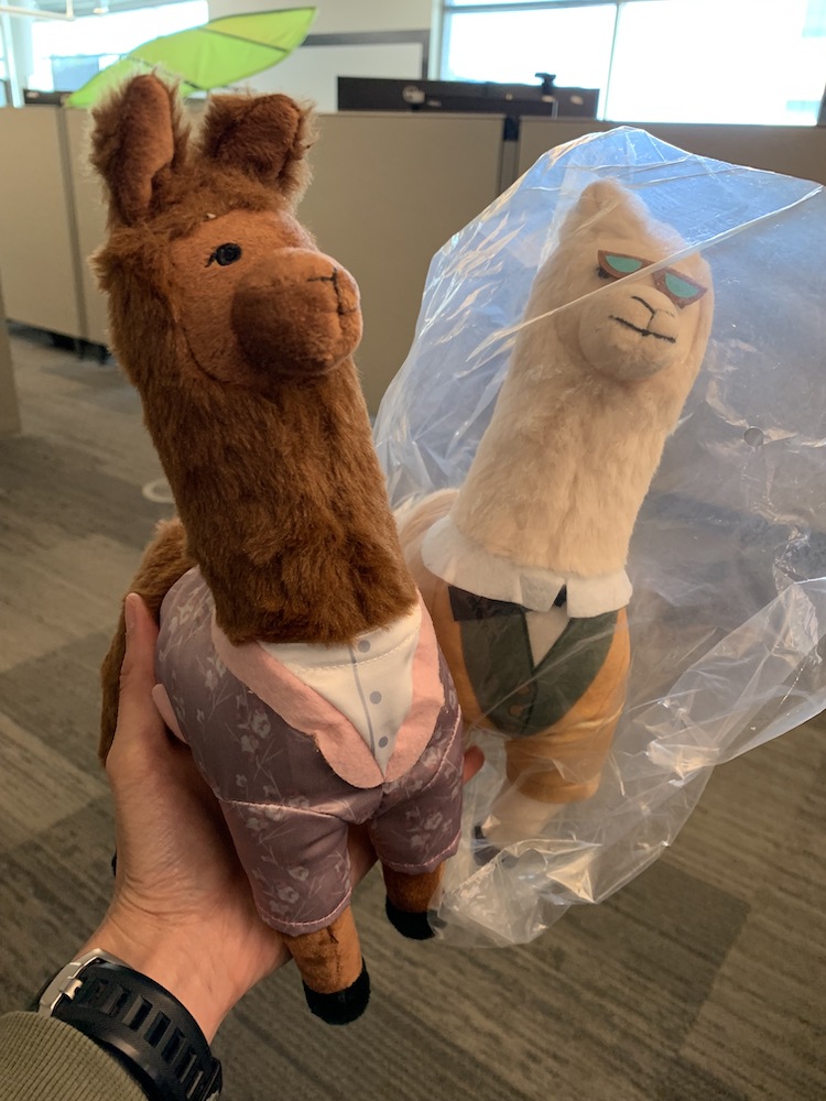 Two llama plush toys.